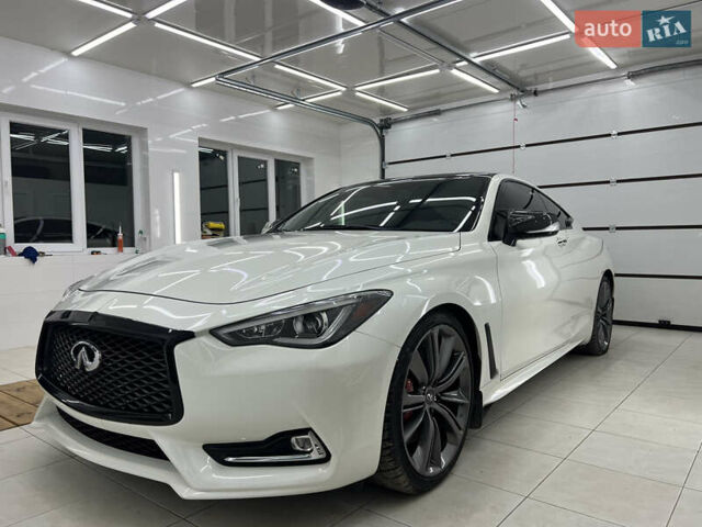 Белый Инфинити Q60, объемом двигателя 3 л и пробегом 75 тыс. км за 19800 $, фото 1 на Automoto.ua