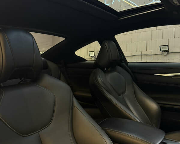 Черный Инфинити Q60, объемом двигателя 3 л и пробегом 83 тыс. км за 22500 $, фото 12 на Automoto.ua