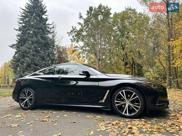 Черный Инфинити Q60, объемом двигателя 1.99 л и пробегом 92 тыс. км за 21500 $, фото 4 на Automoto.ua