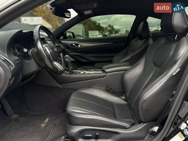 Черный Инфинити Q60, объемом двигателя 3 л и пробегом 97 тыс. км за 21400 $, фото 13 на Automoto.ua