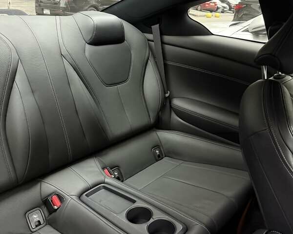 Черный Инфинити Q60, объемом двигателя 3 л и пробегом 55 тыс. км за 27500 $, фото 4 на Automoto.ua