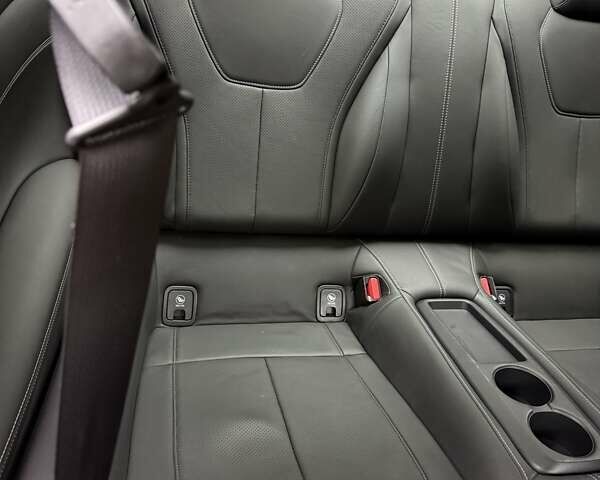 Черный Инфинити Q60, объемом двигателя 3 л и пробегом 55 тыс. км за 27500 $, фото 5 на Automoto.ua