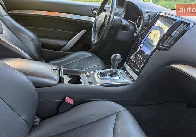 Серый Инфинити Q60, объемом двигателя 3.7 л и пробегом 90 тыс. км за 15500 $, фото 9 на Automoto.ua
