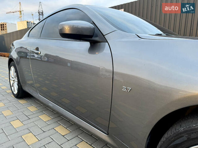 Сірий Інфініті Q60, об'ємом двигуна 3.7 л та пробігом 90 тис. км за 13299 $, фото 12 на Automoto.ua