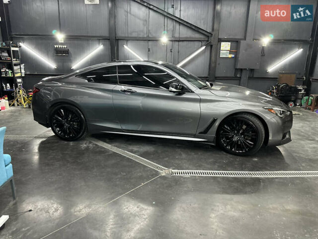 Серый Инфинити Q60, объемом двигателя 3 л и пробегом 107 тыс. км за 20999 $, фото 4 на Automoto.ua