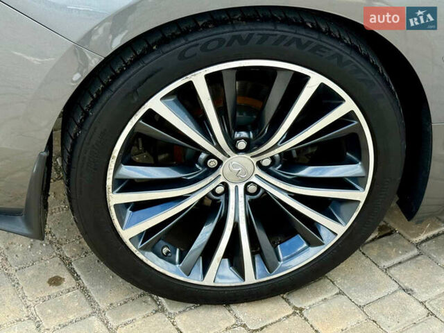 Сірий Інфініті Q60, об'ємом двигуна 1.99 л та пробігом 120 тис. км за 18950 $, фото 12 на Automoto.ua