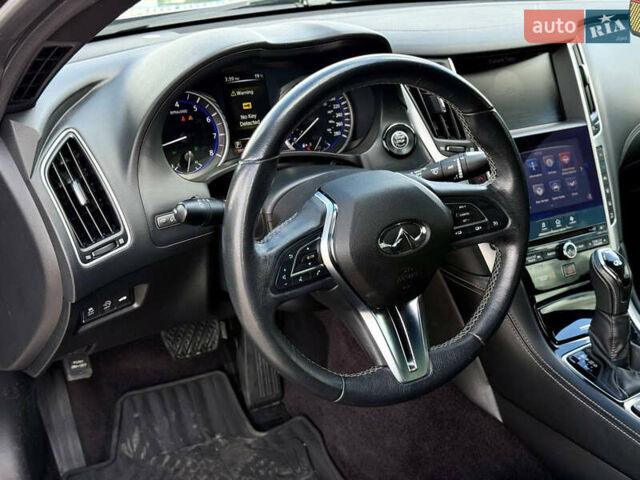 Сірий Інфініті Q60, об'ємом двигуна 1.99 л та пробігом 120 тис. км за 18950 $, фото 13 на Automoto.ua