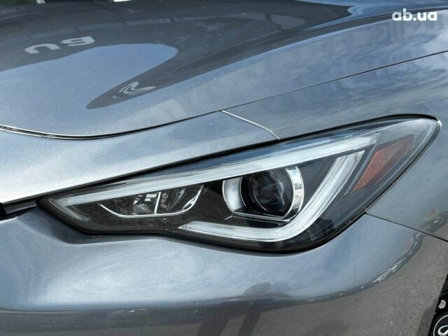 Серый Инфинити Q60, объемом двигателя 3 л и пробегом 88 тыс. км за 26990 $, фото 2 на Automoto.ua