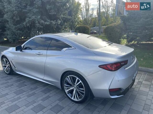 Серый Инфинити Q60, объемом двигателя 3 л и пробегом 97 тыс. км за 24500 $, фото 4 на Automoto.ua