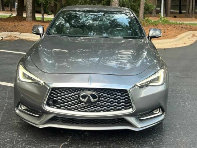Серый Инфинити Q60, объемом двигателя 3 л и пробегом 32 тыс. км за 9800 $, фото 1 на Automoto.ua