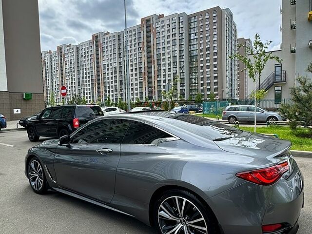 Серый Инфинити Q60, объемом двигателя 3 л и пробегом 80 тыс. км за 23900 $, фото 2 на Automoto.ua