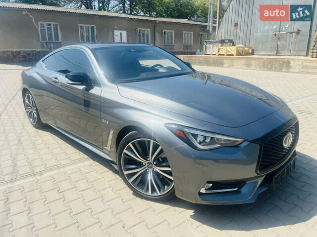 Серый Инфинити Q60, объемом двигателя 3 л и пробегом 64 тыс. км за 22800 $, фото 2 на Automoto.ua