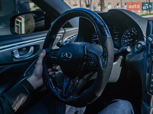 Синий Инфинити Q60, объемом двигателя 3 л и пробегом 98 тыс. км за 22800 $, фото 4 на Automoto.ua