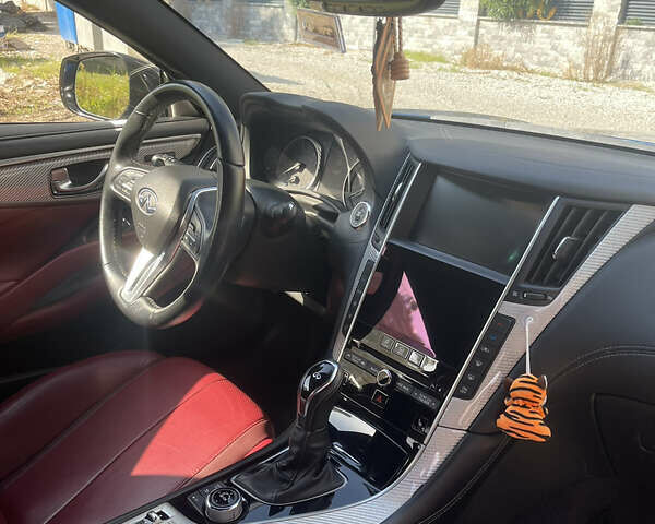 Синий Инфинити Q60, объемом двигателя 3 л и пробегом 69 тыс. км за 25000 $, фото 6 на Automoto.ua