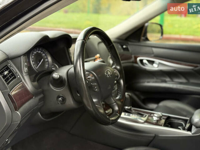 Черный Инфинити Q70, объемом двигателя 2.14 л и пробегом 205 тыс. км за 14900 $, фото 12 на Automoto.ua