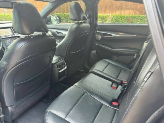 Черный Инфинити КХ, объемом двигателя 2 л и пробегом 11 тыс. км за 11700 $, фото 10 на Automoto.ua