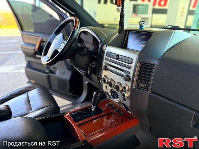 Инфинити КХ, объемом двигателя 5.6 л и пробегом 200 тыс. км за 8700 $, фото 12 на Automoto.ua