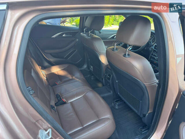 Бежевый Инфинити QX30, объемом двигателя 2 л и пробегом 98 тыс. км за 23000 $, фото 6 на Automoto.ua