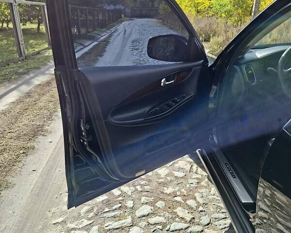 Черный Инфинити QX50, объемом двигателя 3.7 л и пробегом 111 тыс. км за 14000 $, фото 15 на Automoto.ua