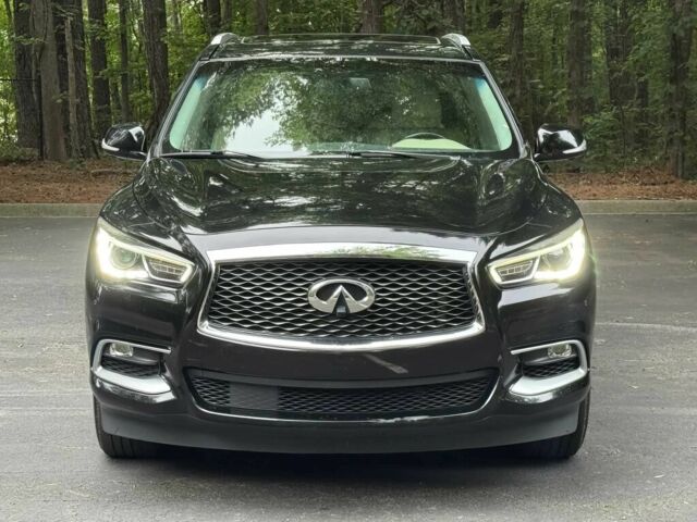 Чорний Інфініті QX60, об'ємом двигуна 3.5 л та пробігом 70 тис. км за 10200 $, фото 1 на Automoto.ua