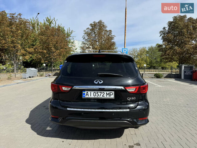 Черный Инфинити QX60, объемом двигателя 3.5 л и пробегом 195 тыс. км за 19000 $, фото 4 на Automoto.ua