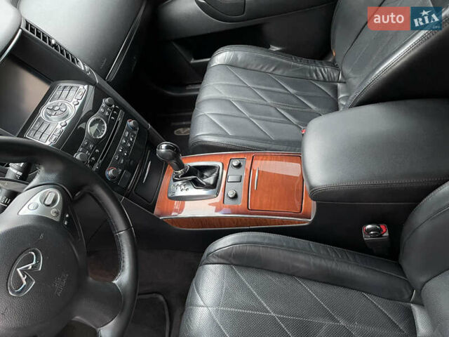 Белый Инфинити QX70, объемом двигателя 2.99 л и пробегом 128 тыс. км за 19800 $, фото 111 на Automoto.ua