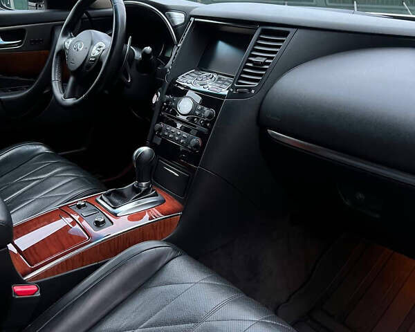 Белый Инфинити QX70, объемом двигателя 3 л и пробегом 179 тыс. км за 21000 $, фото 13 на Automoto.ua