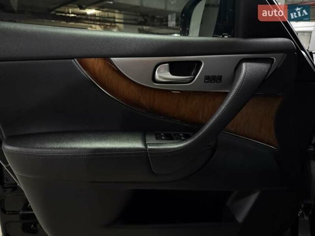 Черный Инфинити QX70, объемом двигателя 3.7 л и пробегом 151 тыс. км за 19700 $, фото 22 на Automoto.ua