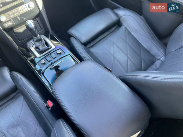 Черный Инфинити QX70, объемом двигателя 5 л и пробегом 171 тыс. км за 18900 $, фото 51 на Automoto.ua