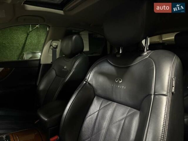 Черный Инфинити QX70, объемом двигателя 3.7 л и пробегом 151 тыс. км за 19700 $, фото 27 на Automoto.ua