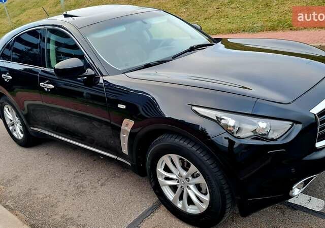 Черный Инфинити QX70, объемом двигателя 3.7 л и пробегом 212 тыс. км за 14950 $, фото 22 на Automoto.ua