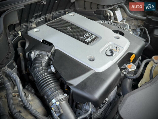 Черный Инфинити QX70, объемом двигателя 3.7 л и пробегом 118 тыс. км за 16700 $, фото 84 на Automoto.ua