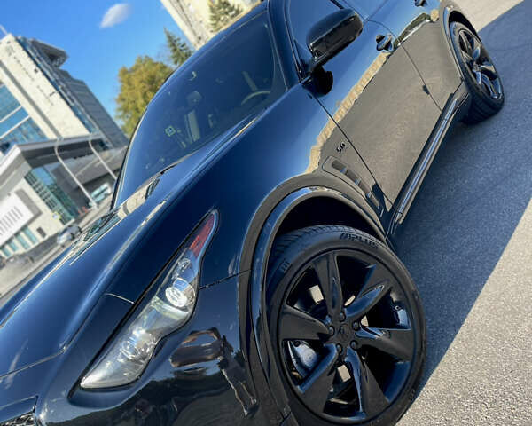 Черный Инфинити QX70, объемом двигателя 5 л и пробегом 171 тыс. км за 18900 $, фото 4 на Automoto.ua