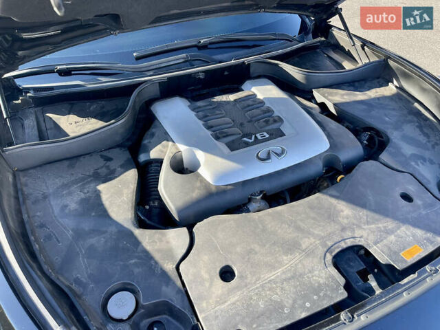 Черный Инфинити QX70, объемом двигателя 5 л и пробегом 171 тыс. км за 18900 $, фото 54 на Automoto.ua