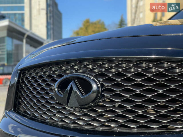 Черный Инфинити QX70, объемом двигателя 5 л и пробегом 171 тыс. км за 18900 $, фото 6 на Automoto.ua