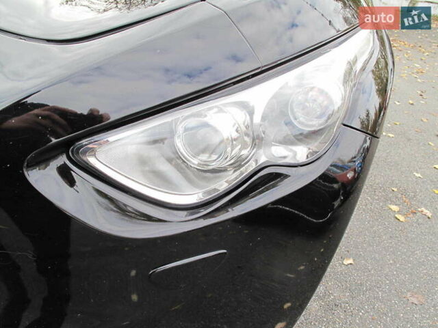 Черный Инфинити QX70, объемом двигателя 3.7 л и пробегом 235 тыс. км за 17300 $, фото 14 на Automoto.ua