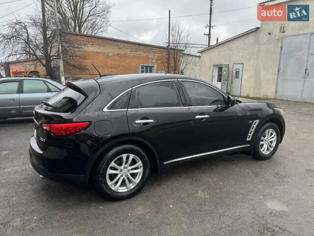 Черный Инфинити QX70, объемом двигателя 3.7 л и пробегом 185 тыс. км за 17700 $, фото 4 на Automoto.ua