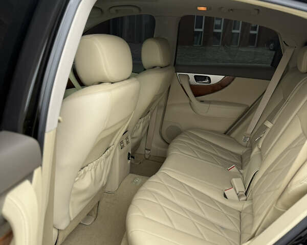 Черный Инфинити QX70, объемом двигателя 3.7 л и пробегом 131 тыс. км за 14299 $, фото 13 на Automoto.ua