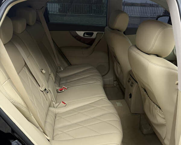 Черный Инфинити QX70, объемом двигателя 3.7 л и пробегом 131 тыс. км за 13599 $, фото 19 на Automoto.ua