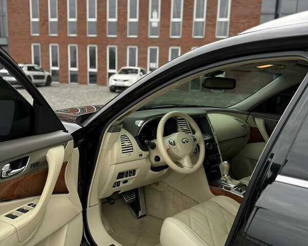 Черный Инфинити QX70, объемом двигателя 3.7 л и пробегом 131 тыс. км за 13599 $, фото 14 на Automoto.ua