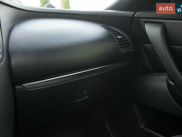 Черный Инфинити QX70, объемом двигателя 3.7 л и пробегом 124 тыс. км за 23000 $, фото 41 на Automoto.ua