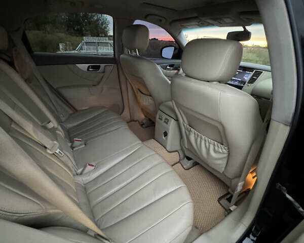 Черный Инфинити QX70, объемом двигателя 3.7 л и пробегом 193 тыс. км за 15700 $, фото 11 на Automoto.ua