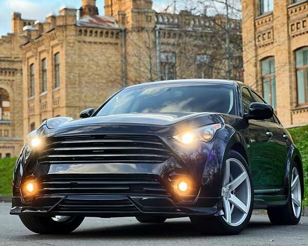 Черный Инфинити QX70, объемом двигателя 3.7 л и пробегом 128 тыс. км за 26500 $, фото 4 на Automoto.ua