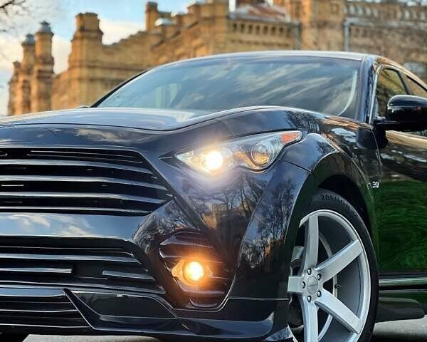 Черный Инфинити QX70, объемом двигателя 3.7 л и пробегом 128 тыс. км за 26500 $, фото 1 на Automoto.ua