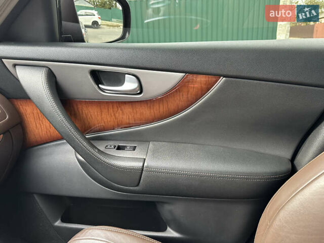 Фиолетовый Инфинити QX70, объемом двигателя 3.7 л и пробегом 110 тыс. км за 20500 $, фото 42 на Automoto.ua