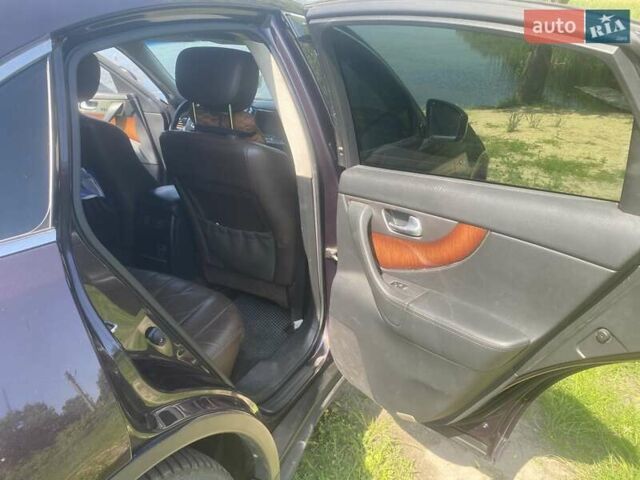 Фиолетовый Инфинити QX70, объемом двигателя 2.99 л и пробегом 145 тыс. км за 19200 $, фото 13 на Automoto.ua