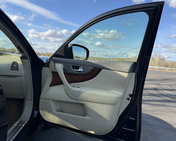 Коричневый Инфинити QX70, объемом двигателя 3.7 л и пробегом 168 тыс. км за 20000 $, фото 9 на Automoto.ua