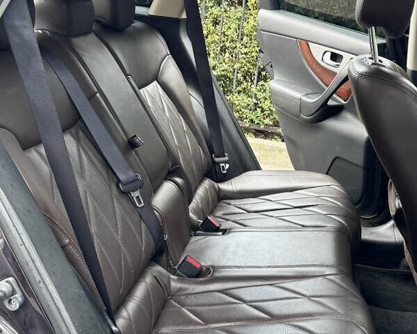 Коричневый Инфинити QX70, объемом двигателя 2.99 л и пробегом 115 тыс. км за 21000 $, фото 4 на Automoto.ua