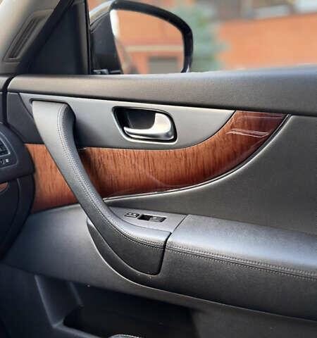 Синий Инфинити QX70, объемом двигателя 2.99 л и пробегом 117 тыс. км за 25300 $, фото 23 на Automoto.ua