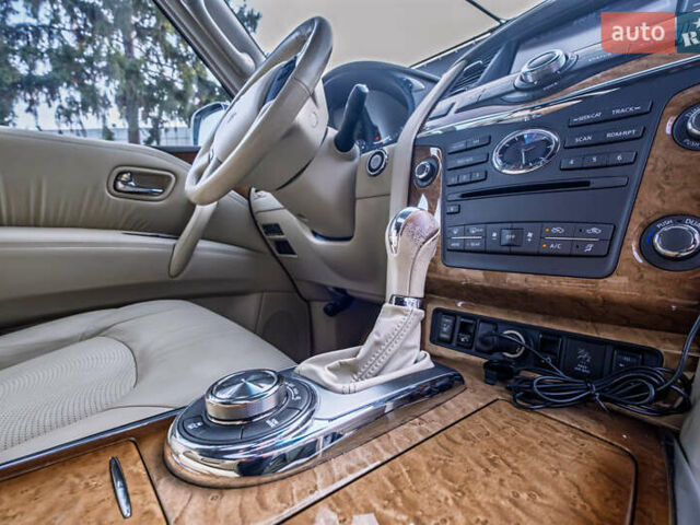 Белый Инфинити QX80, объемом двигателя 5.55 л и пробегом 81 тыс. км за 25000 $, фото 38 на Automoto.ua